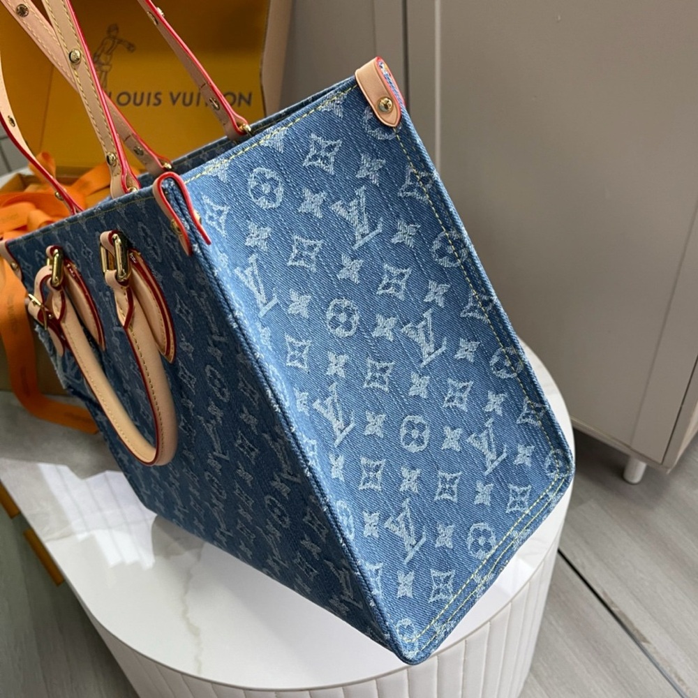Louis Vuitton On The Go (OTG) MM Monogram remix Tote Bag - Picture 9 of 9